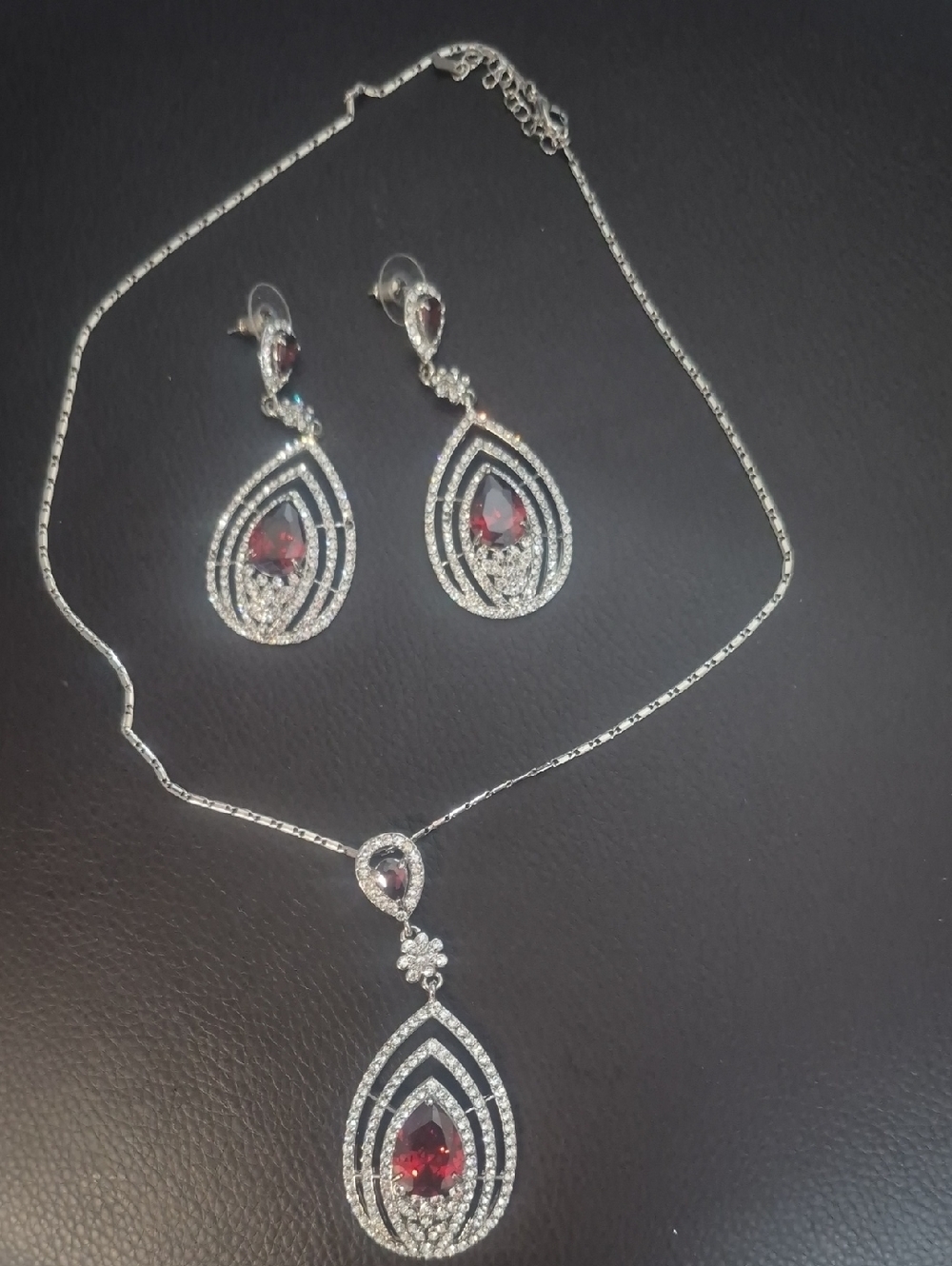 Silver Teardrop Necklace and Earring Set with Red Gemstones